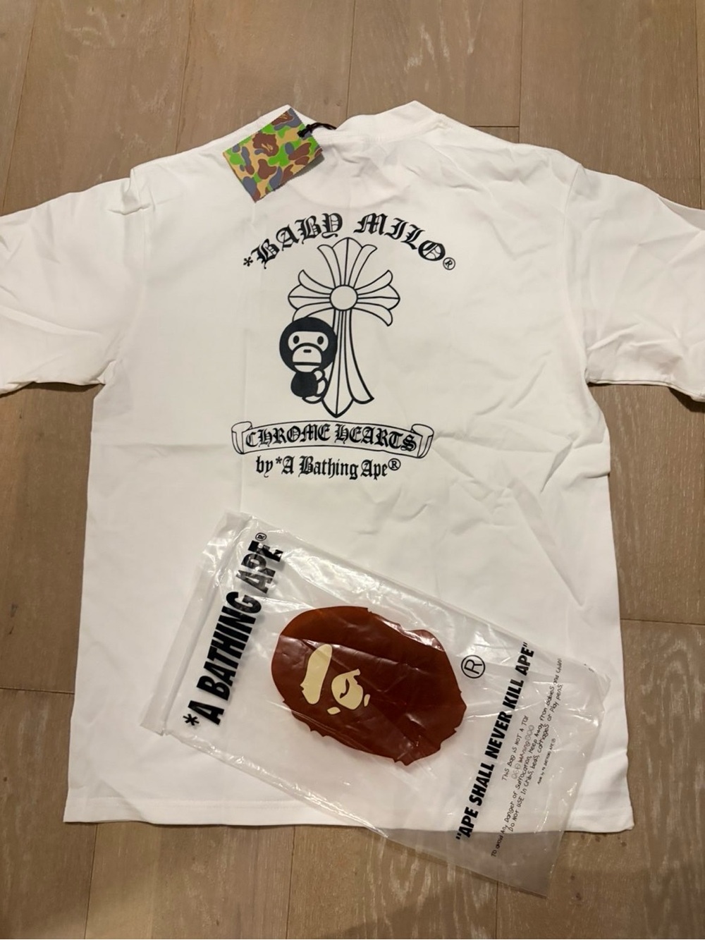 Chrome Hearts White Kids Tee with Black Baby Milo Cross Graphic